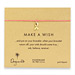 make a wish bracelet with gold dipped ribbon on fuchsia