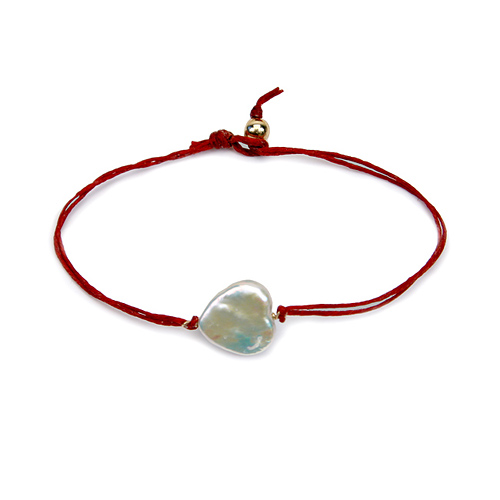 heart pearl bracelet on red irish linen