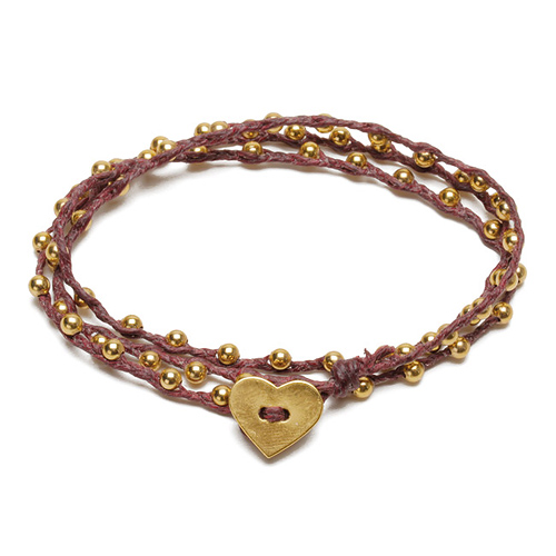 sparkle wrap bracelet with gold dipped heart closure on maroon irish linen