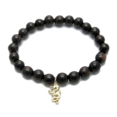 wood bracelet in ebony with gold dipped dragon