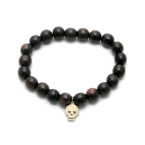 wood bracelet in ebony with gold dipped skull