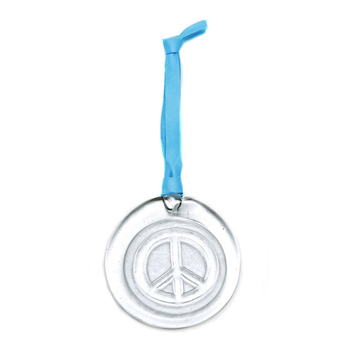 recycled glass peace ornament on light blue leather