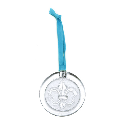 recycled glass fleur di lis ornament on light blue leather