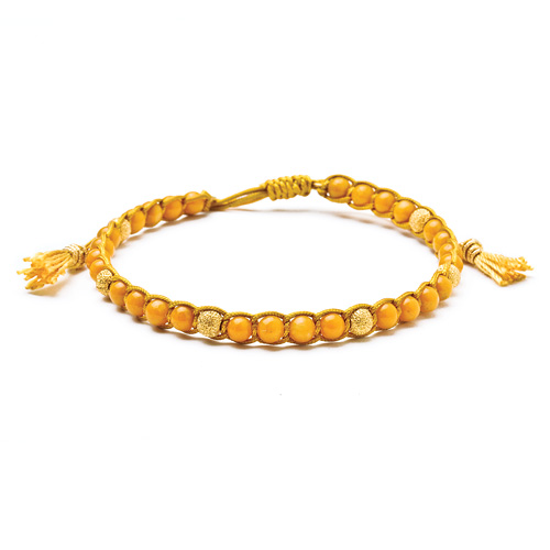yellow jasper healing gem bracelet with gold dipped stardust beads and tassel