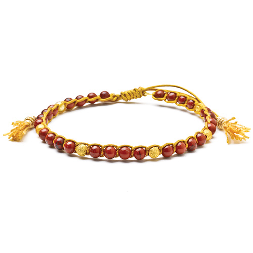red jasper healing gem bracelet with gold dipped stardust beads and tassel