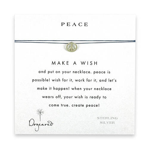 peace make a wish necklace with sterling silver peace sign on ocean