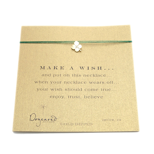 make a wish necklace with gold dipped four leaf clover on emerald
