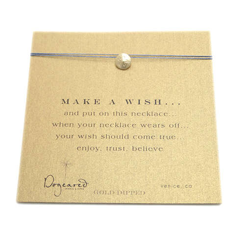 make a wish necklace with gold dipped sand dollar on ocean