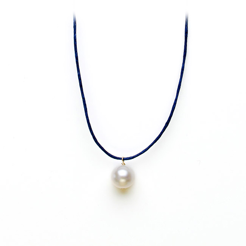 white pearl on navy waxed cotton, gold dipped toggle closure