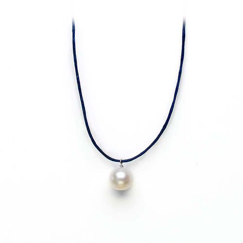 white pearl on navy waxed cotton, sterling silver toggle closure