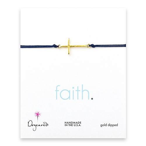 sideways cross bracelet on navy cord, gold dipped