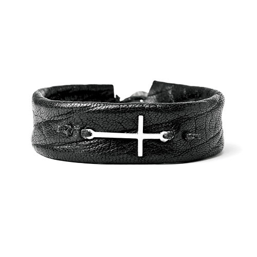 sideways cross cuff bracelet on navy leather, sterling silver