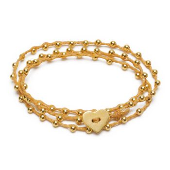 sparkle wrap bracelet with gold dipped heart closure on natural irish linen