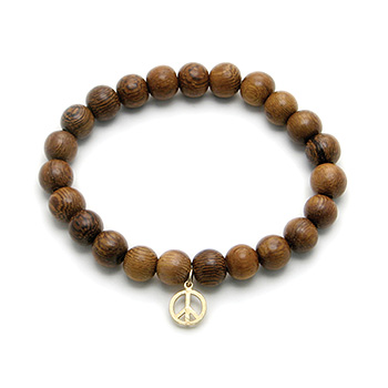 wood bracelet in teak with gold dipped peace sign