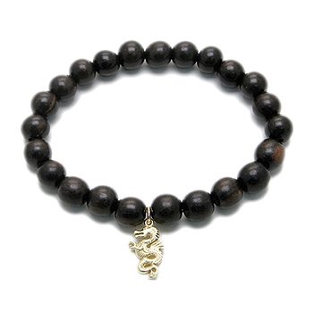 wood bracelet in ebony with gold dipped dragon