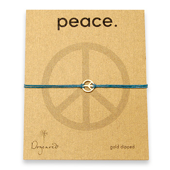 small peace bracelet gold dipped on teal irish linen