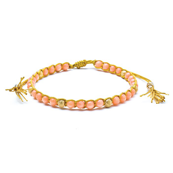 pink+coral+healing+gem+bracelet+with+gold+dipped+stardust+beads+and+tassel