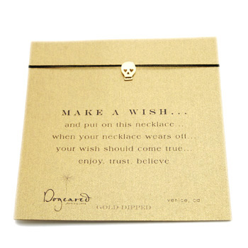make a wish necklace with gold dipped skull on black