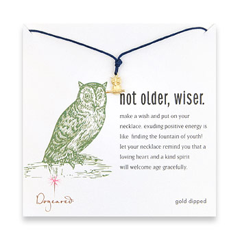 gold dipped not older, wiser necklace on navy waxed cotton