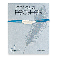 light as a feather medium sterling silver feather bracelet on teal irish linen