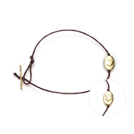 the love and luck gold dipped bracelet with chocolate waxed cotton