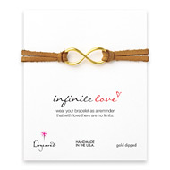 large infinite love gold dipped bracelet on latte leather
