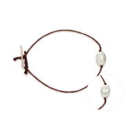 the love and luck sterling silver bracelet with chocolate waxed cotton