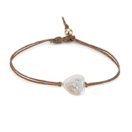heart pearl bracelet on tobacco irish linen