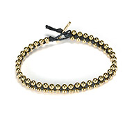 sparkle macrame bracelet with parallel brass beads on black irish linen
