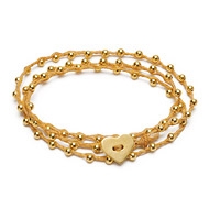 sparkle wrap bracelet with gold dipped heart closure on natural irish linen
