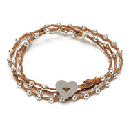 sparkle wrap bracelet with sterling silver heart closure on tobacco irish linen