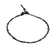 sparkle twisted strand charcoal bracelet on black irish linen
