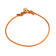gold dipped peace bead bracelet on burnt orange leather cord