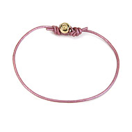 gold dipped peace bead bracelet on lavender leather cord