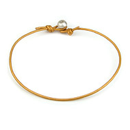 oxidized peace bead bracelet on honey leather cord