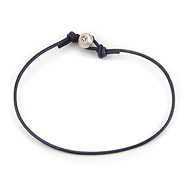 oxidized peace bead bracelet on navy leather cord