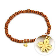 not to worry teeny tiny rust wood bracelet with gold dipped four leaf clover