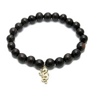 wood bracelet in ebony with gold dipped dragon