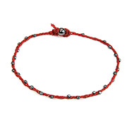 sparkle twisted strand charcoal bracelet on red irish linen