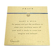 peace make a wish necklace with gold dipped peace sign on ocean