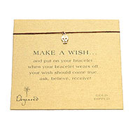 make a wish bracelet with gold dipped skull on maroon