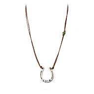 luckiest horseshoe necklace sterling silver with jade gem on tobacco