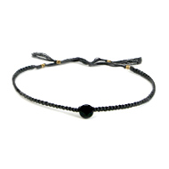 friendship bracelet with onyx gem on pebble thread