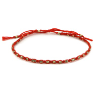 friendship bracelet with brass beads on fire thread