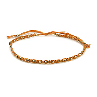 friendship bracelet with brass beads on honey thread