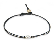 pearl bracelet on black irish linen