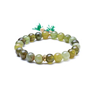 green garnet stretch healing gem bracelet with emerald tassel