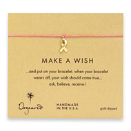make a wish bracelet with gold dipped ribbon on fuchsia