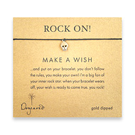 rock on make a wish bracelet with gold dipped skull on black irish linen