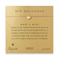 new beginnings lotus flower necklace on coral, gold dipped